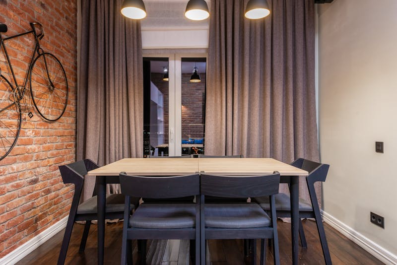 Delivery driver on a motorcycle carrying pizza